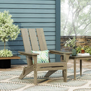 Noble House Aurascape outdoor foldable Adirondack chair with armrests, made of weather-resistant material, in a relaxed seating position.
