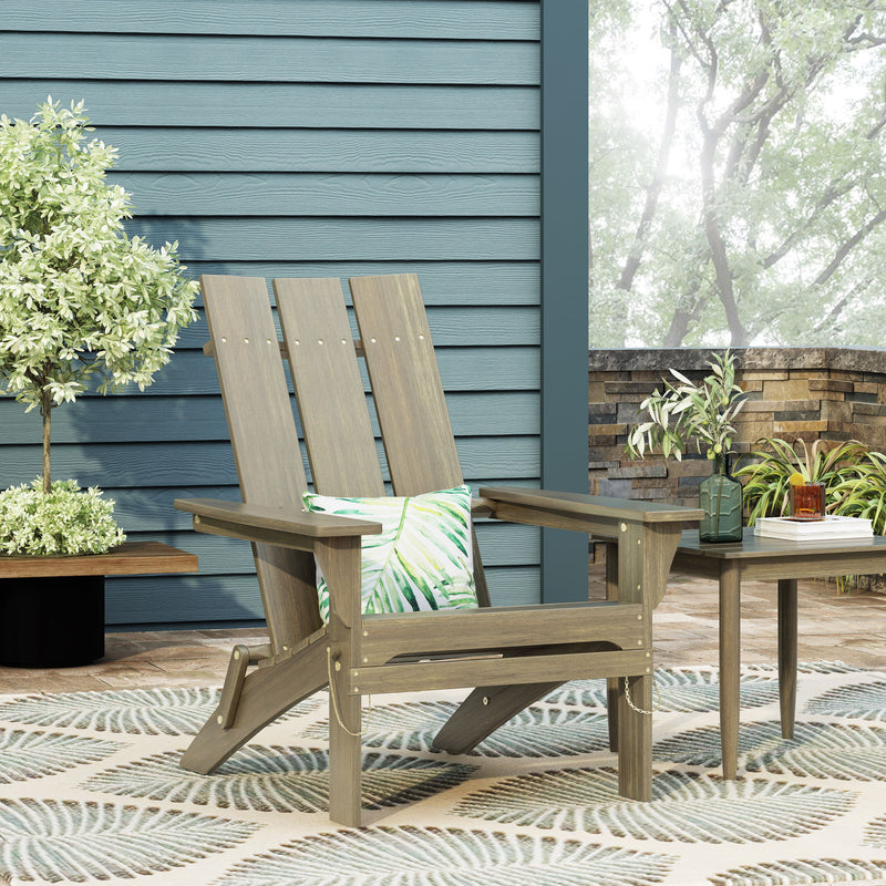 Noble House Aurascape outdoor foldable Adirondack chair with armrests, made of weather-resistant material, in a relaxed seating position.