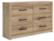 Benchcraft® Brozmont dresser with multiple drawers and sleek wood finish, ideal for bedroom storage and organization.
