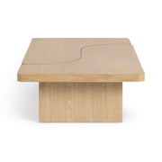 Classic Home Melina coffee table with a sleek wooden surface and modern design, shown in a stylish living room setting.