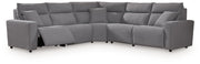 Signature Design by Ashley Modmax II reclining sectional in salt and pepper fabric, showing plush cushions and reclining seats.