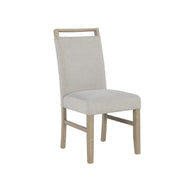 Vanilla beige marble dining table with four upholstered chairs, part of a 5-piece Global Furniture USA dining room set.