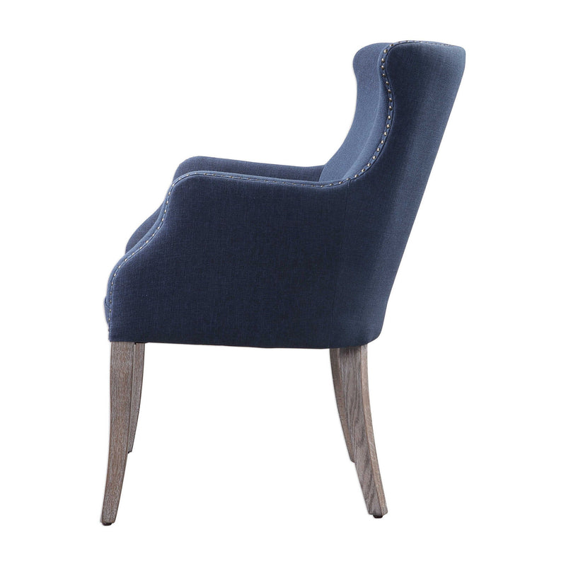 Blue Yareena Wing Chair by Uttermost featuring a classic wingback design with plush upholstery and wooden legs.