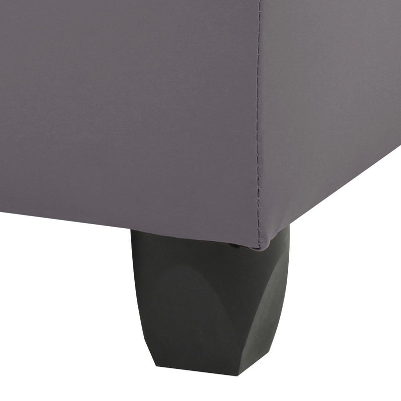 Contemporary upholstered storage ottoman by Glory Furniture with a sleek design and soft fabric in a modern living room setting