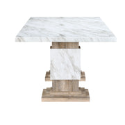 Global Furniture USA Stacey beige dining table with pedestal base, showcasing a sleek, modern design perfect for contemporary dining spaces.