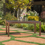 Dark brown acacia wood outdoor dining table with slatted top from Noble House, ideal for patio or garden dining spaces.