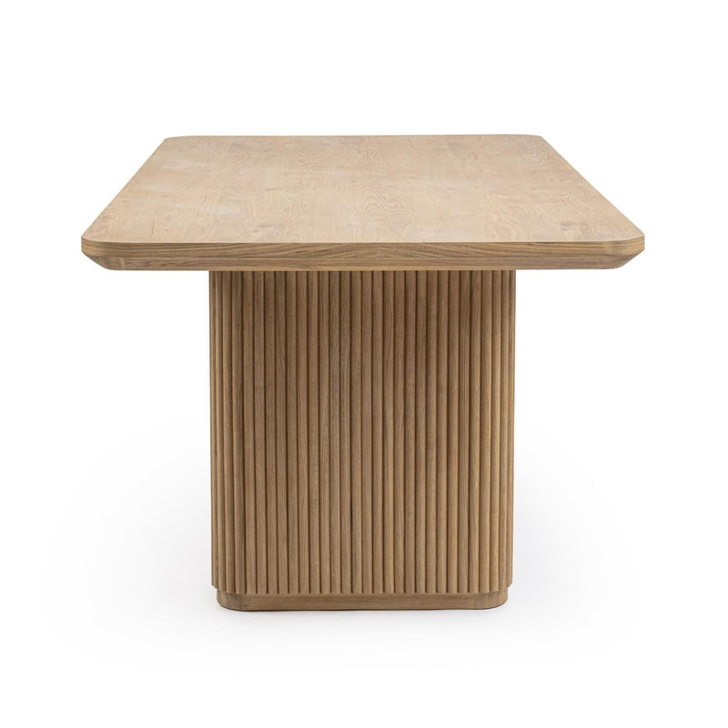 Classic Home Vander oak wood dining table, 84 inches long, showcasing a smooth tabletop and sturdy wooden legs.
