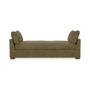 Classic Home Audrey daybed with a wooden frame and upholstered cushions, shown in a cozy, stylish bedroom setting.