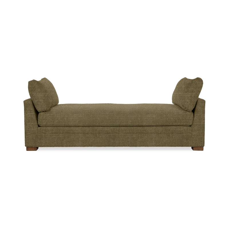 Classic Home Audrey daybed with a wooden frame and upholstered cushions, shown in a cozy, stylish bedroom setting.