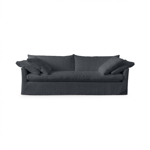 Classic Home Cassiano slip cover sofa with plush cushions and neutral fabric, showcasing a stylish stationary sofa design.