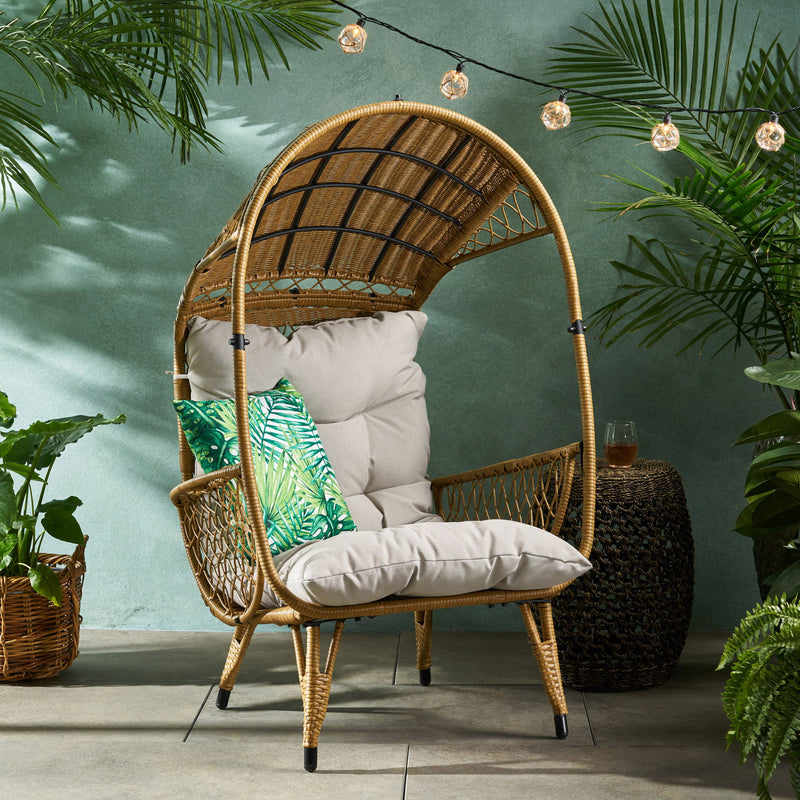 Noble House outdoor wicker standing basket chair with cushion, stylish accent chair for patio or garden seating.