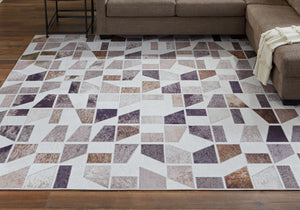 Colorful Signature Design by Ashley Jettner area rug with intricate pattern and plush texture, ideal for modern living rooms.