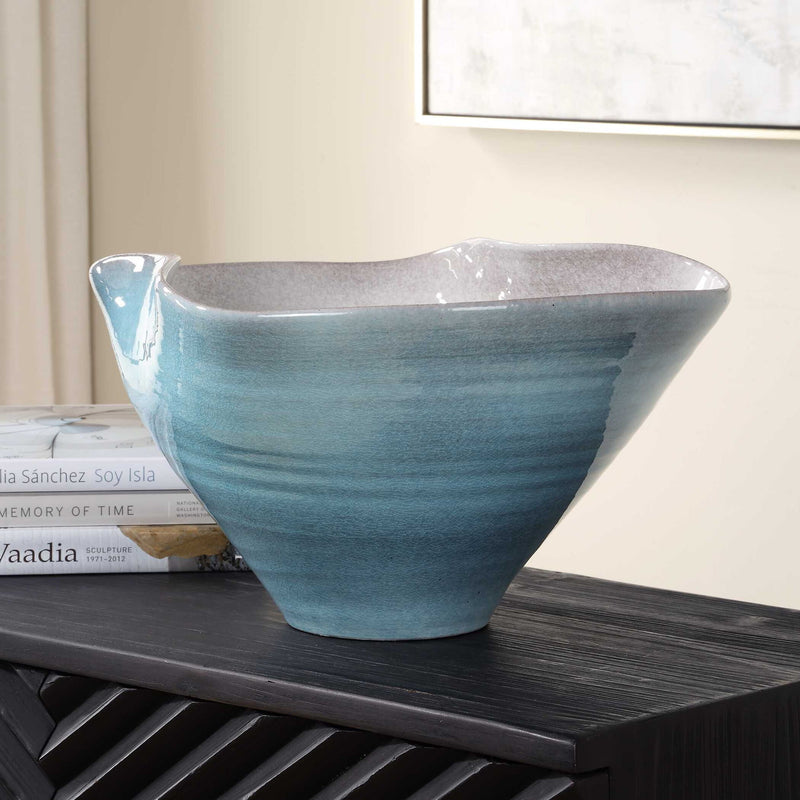Blue Crest ceramic bowl by Uttermost featuring a smooth blue glaze and rounded shape, perfect for serving or decorative use.