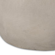 Outdoor oval-shaped side table by Noble House, featuring a smooth surface and sturdy frame for patio or garden use.