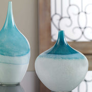 Set of two Uttermost Carla vases, white and teal ceramic vases with smooth finishes, displayed together.