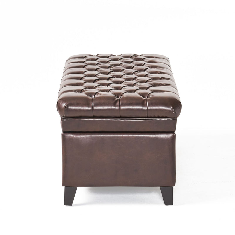 Juliana storage ottoman by Noble House with birch wood legs, upholstered in soft fabric, showing its cushioned top and stylish design.