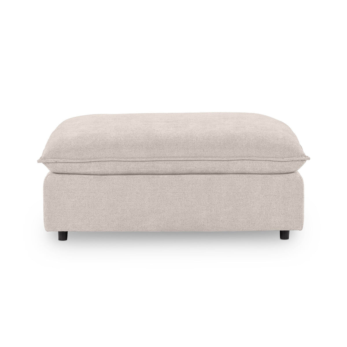 Classic Home Caplan upholstered ottoman with a plush fabric cover and sturdy wooden legs, perfect as a versatile footrest or accent piece.