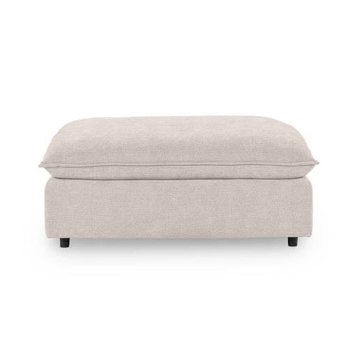 Classic Home Caplan upholstered ottoman with a plush fabric cover and sturdy wooden legs, perfect as a versatile footrest or accent piece.