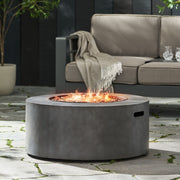 Round Noble House iron fire pit with 40,000 Btu burner, featuring a black metal finish and sturdy design for outdoor heating.