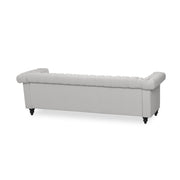 Noble House Chesterfield style 3-seater sofa with deep button tufting and classic stationary design in rich upholstery.