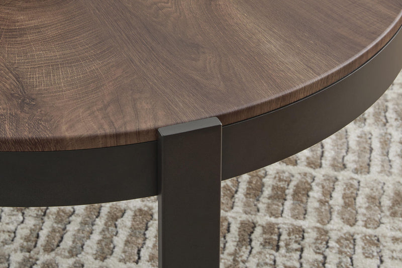 Set of three Horizon Hills occasional tables by Signature Design Ashley in brown and black with sleek, modern tabletop surfaces