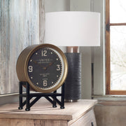 Black Shyam tabletop clock by Uttermost featuring a sleek, modern design perfect for stylish home decor.