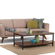 Simpli-Home Skyler coffee table in dark cognac brown wood with a modern rectangular design and sturdy legs.