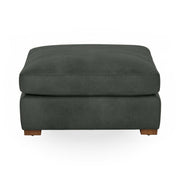 Classic Home Audrey upholstered ottoman with plush fabric and wooden legs, ideal for living room or bedroom decor.