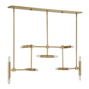 Uttermost 14 Light Modern Linear Pendant in gold with sleek linear design, suspended from a minimal fixture, ideal for contemporary lighting.