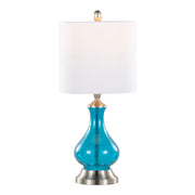 Contemporary Jasmine table lamp by Lumi Source with clear sapphire blue seeded glass, nickel finish, and white accents.