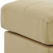 Upholstered casual ottoman by Glory Furniture in stylish living room with soft fabric and modern design.