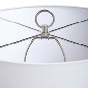 Uttermost Cyprien gray and white table lamp with a sleek, modern design and smooth ceramic finish.