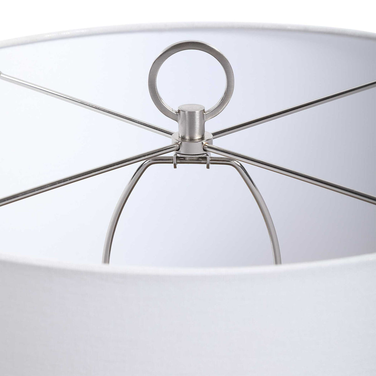 Uttermost Cyprien gray and white table lamp with a sleek, modern design and smooth ceramic finish.