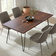 Hunter handcrafted dining table by Simpli-Home, showcasing a sturdy wooden table with a smooth finish and classic design.