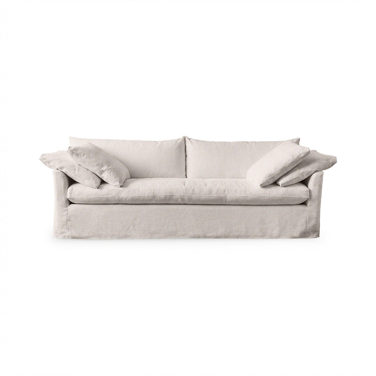 Classic Home Cassiano slip cover sofa in a cozy living room, showcasing a stylish stationary sofa with a tailored fabric cover.
