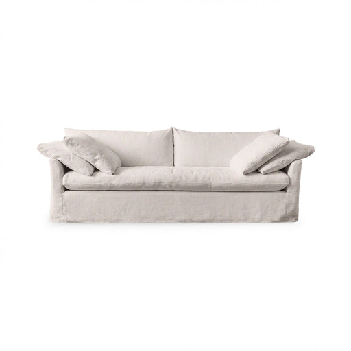 Classic Home Cassiano slip cover sofa in a cozy living room, showcasing a stylish stationary sofa with a tailored fabric cover.