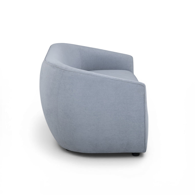 TOV Furniture Jordan stationary loveseat with plush upholstery and modern design, shown in a cozy living room setting.