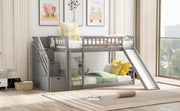 Gray DreamHaus twin over twin bunk bed with stairway, two drawers, and slide, featuring safety railings and a sturdy frame.