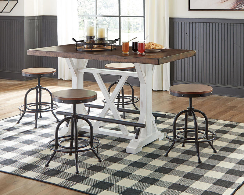 Rectangular white and brown Valebeck dining room counter table by Signature Design Ashley, showing a modern wooden table with clean lines.