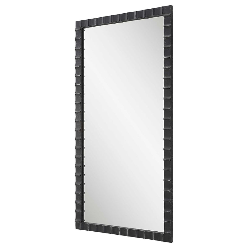 Black industrial wall mirror by Uttermost with a sturdy metal frame, showcasing a modern, minimalist design.