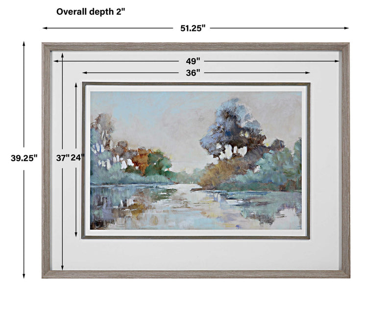 Framed watercolor print titled "Morning Lake" by Uttermost, featuring a serene blue lakeside scene in a sleek frame.