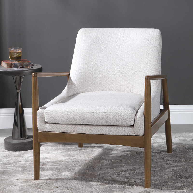 White Bev accent arm chair by Uttermost with a sleek, modern design and plush upholstery.