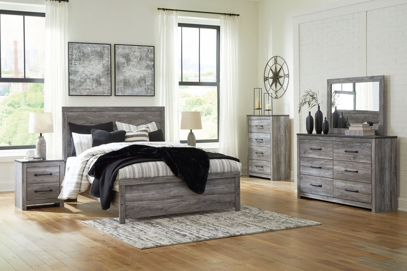 Signature Design by Ashley Bronyan 5-piece bedroom set with bed frame, dresser, mirror, nightstands, and matching decor in a modern style.