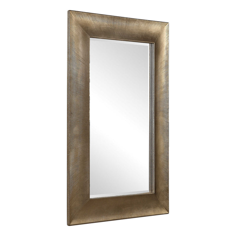 Large champagne wall mirror from Uttermost's Valenton collection, featuring a sleek, reflective surface and elegant frame.