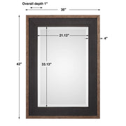 Uttermost Staveley rustic black wall mirror with a textured wooden frame, ideal for modern or farmhouse decor styles.