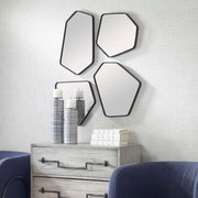 Set of four black wall mirrors from Uttermost's Linneah collection, featuring sleek, modern frames for stylish home decor.