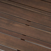 Rustic gray Noble House Oana Brava coffee table with slat panel design, showcasing a sturdy wooden construction and modern farmhouse style.