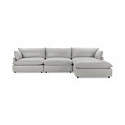 Classic Home Caplan modular sectional sofa with plush cushions and modern design, shown in a cozy living room setting.