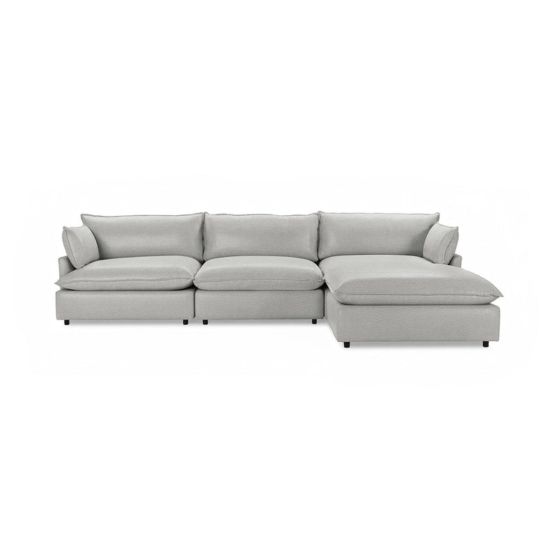 Classic Home Caplan modular sectional sofa with plush cushions and modern design, shown in a cozy living room setting.