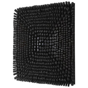 Uttermost Portside wood wall panel used as wall decor, showcasing textured natural wood slices arranged in a decorative pattern.